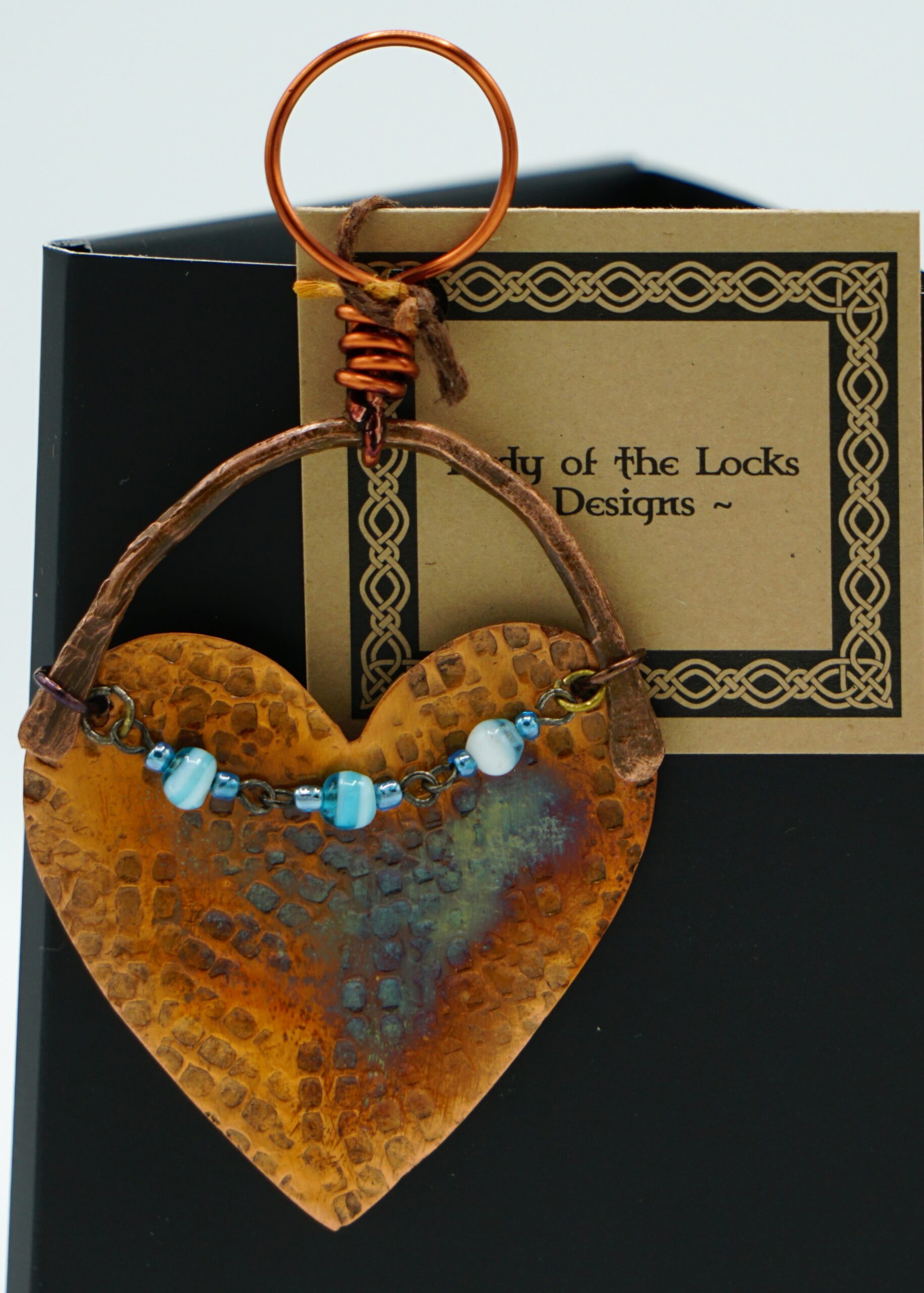Copper Ornament With Blue Beads